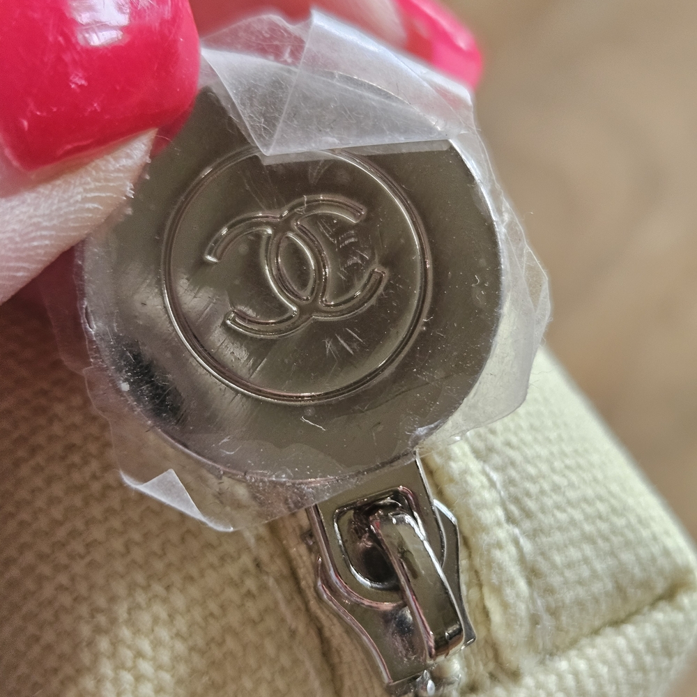 Free With $80 Bundle Chanel Cream Canvas Pouch